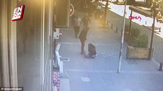 The shocking CCTV footage captures a man relentlessly hitting a defenceless woman on the head