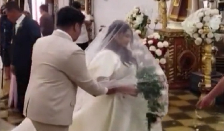 Φιλιππίνες: Ούτε οι πλημμύρες δεν σταμάτησαν ζευγάρι από το να παντρευτεί – Το νυφικό επέπλεε στην ε...